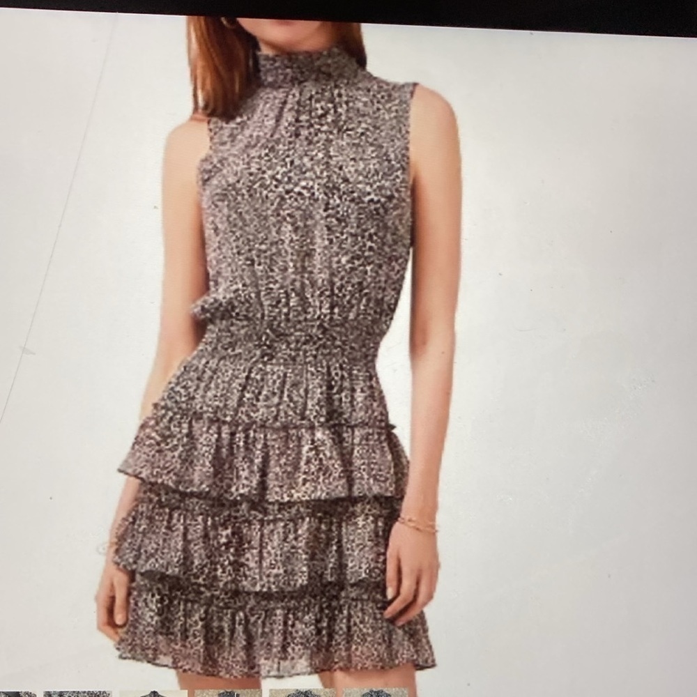 19.  Good condition, no flaws.  Mock ruffle neck,  medium ,  elastic waist, pit.